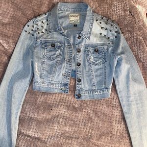 Cropped jean jacket with shoulder studs